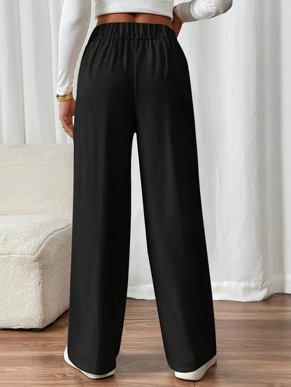 Orvella – Calça Confortável com Pernas Largas e Bolsos
